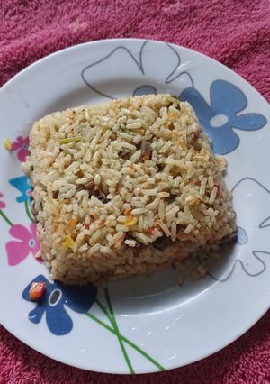 Una foto de Arroz con riñón de res