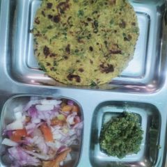 A picture of Missi roti with Amla chutney.