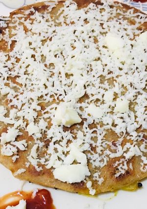 A picture of Stuff Pizza paratha.