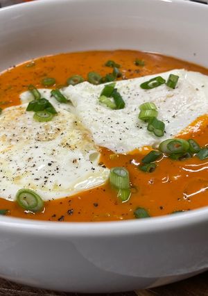 A picture of Tomato Basil with Fried Eggs.