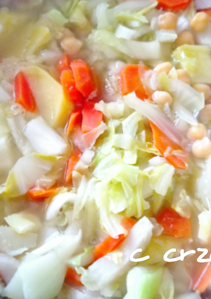 Una foto de Garbanzos con berza