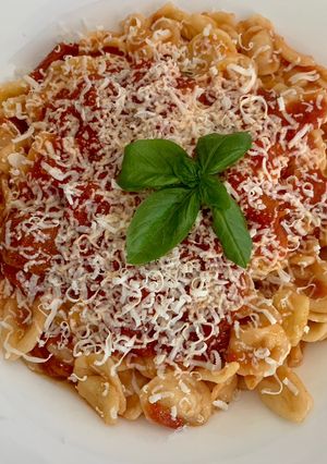 A picture of Orecchiette (Strascinate) from Bari with Fresh Tomato Sauce and Ricotta Salata.