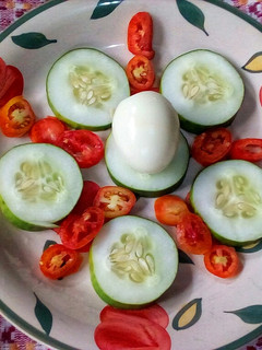 A picture of Cucumber and Tomatoes Salad.