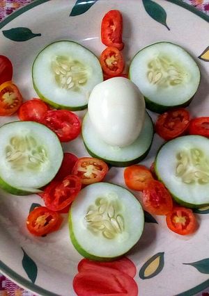 A picture of Cucumber and Tomatoes Salad.