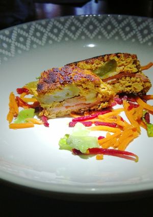 A picture of Stuffed pork meat loaf.