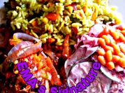 A picture of rice beans and coleslaw