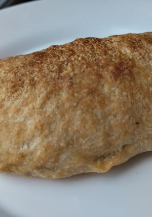 Una foto de Empanada🥟de cebolla caramelizada y carnes🥟🧅🥩