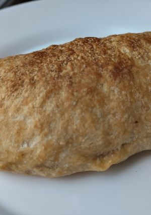 Una foto de Empanada🥟de cebolla caramelizada y carnes🥟🧅🥩