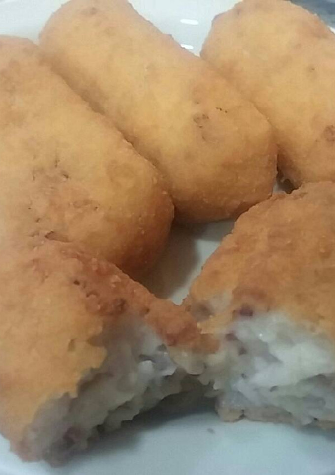 Una foto de 33. Croquetas de pulpo