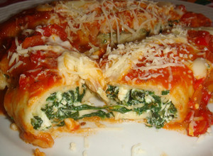 Una foto de Canelones de espinaca, ricota y queso