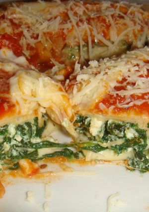 Una foto de Canelones de espinaca, ricota y queso