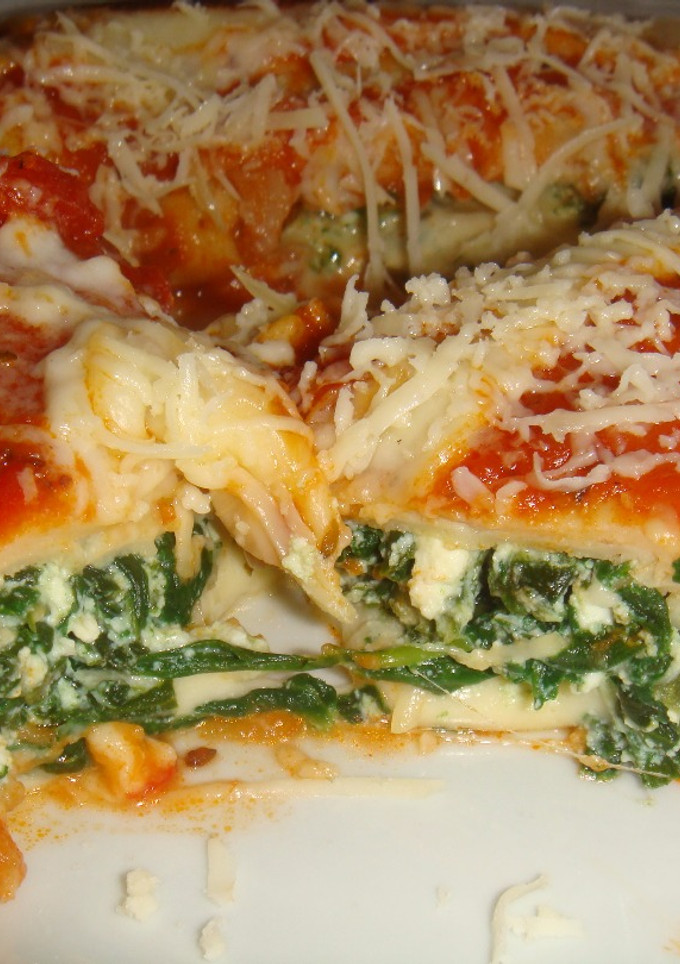 Una foto de Canelones de espinaca, ricota y queso