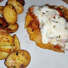 Mozzarella chicken with sautéed tomato's A picture of Mozzarella chicken with sautéed tomato's.