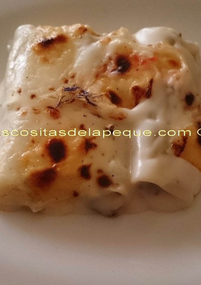 Una foto de Canelones con grelos y chorizo gratinados con queso de tetilla (exprés) 