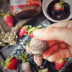A picture of Chocolate coated strawberries.