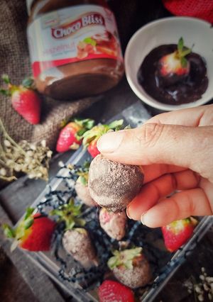 A picture of Chocolate coated strawberries.