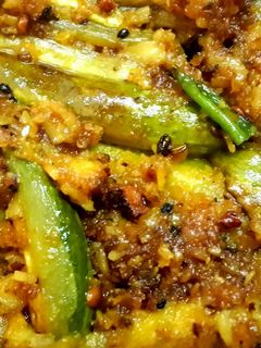 A picture of Potol narkol posto (pointed gourd in coconut poppy seed paste).