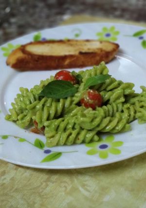 A picture of Pesto pasta.