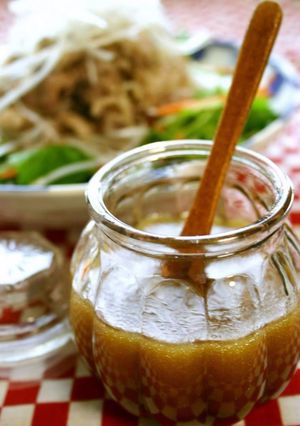 A picture of Honey Wasabi Dressing & Pork-Topped Salad.