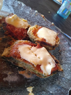 Una foto de Milanesas de berenjenas esponjosas a la napolitana