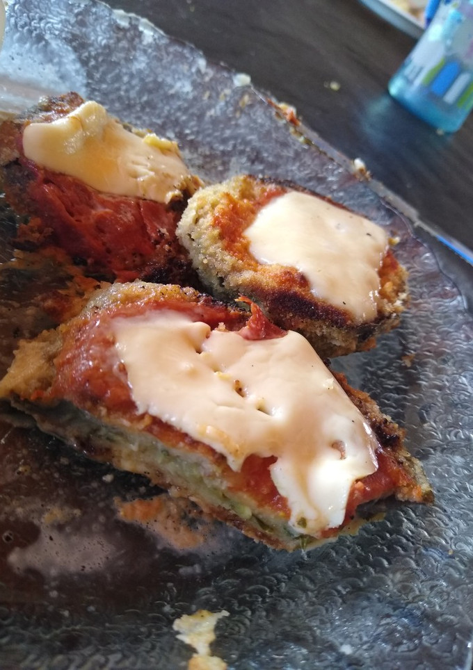Una foto de Milanesas de berenjenas esponjosas a la napolitana