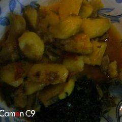 A picture of Matoke and meat stew.
