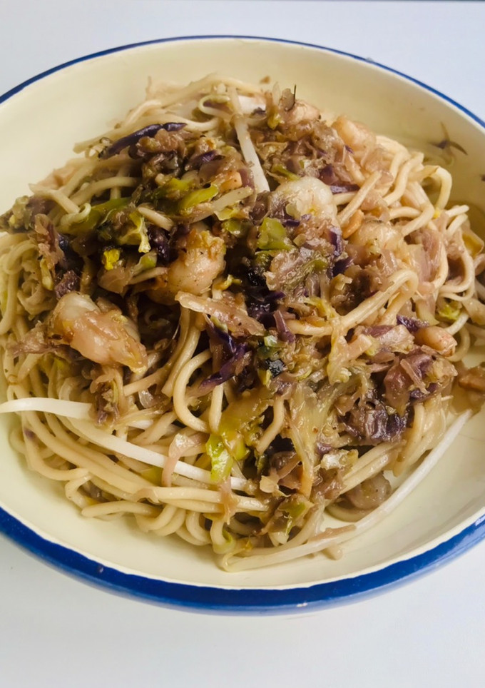 Una foto de Noodles con tres coles