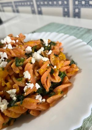 A picture of Red Lentil Pasta with Pumpkin Cream, Spinach, and Feta.