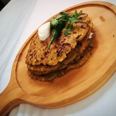 A picture of Leftover herbal khichdi paratha.
