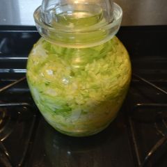Homemade Sauerkraut in Fermentation Jar A picture of Homemade Sauerkraut in Fermentation Jar.