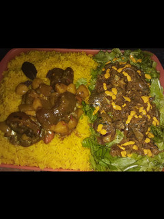 A picture of Turmeric rice with vegetable soup and salad.
