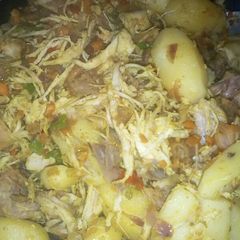 A picture of Shredded fried chicken and potatoes.