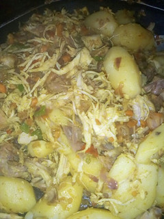 A picture of Shredded fried chicken and potatoes.