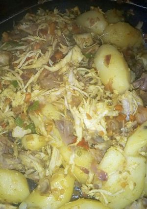 A picture of Shredded fried chicken and potatoes.