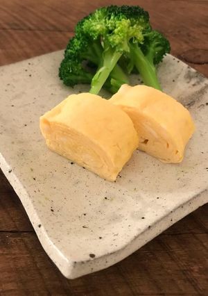 A picture of Dashimaki Tamago (Japanese style fluffy egg omelette) - Tamagoyaki.