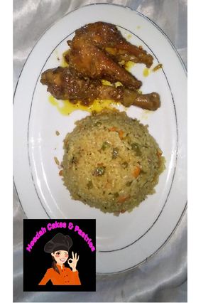 A picture of Fried rice and peppered chiken.