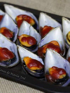 Una foto de Mejillones en salsa de tomate