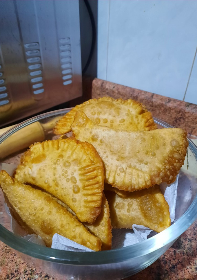 Una foto de Empanadas de queso en máquina de pan