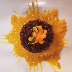 A picture of Chocolate risotto with mango salsa & mango puree.