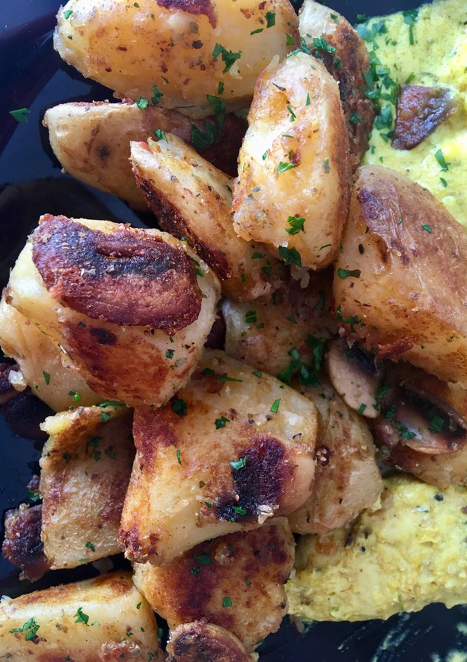 Una foto de Patatas gajo ligeras con champiñones