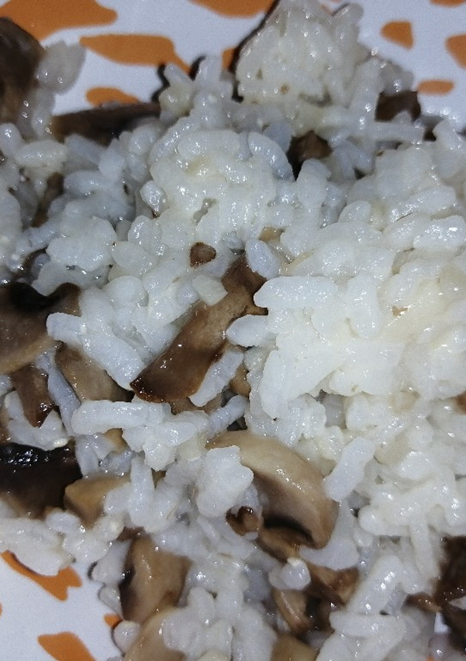 Una foto de Arroz con champiñones al parmesano