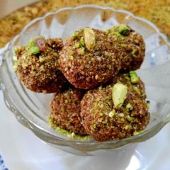 A picture of Sesame seeds and dry fruit laddo.
