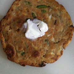 A picture of Mixed veg Thepla with homemade butter.