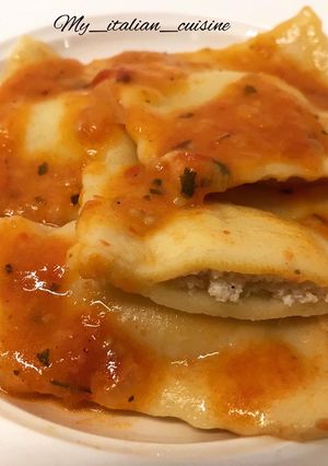 A picture of Shrimp and Ricotta Ravioli with Fresh Cherry Tomato Sauce.
