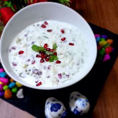 A picture of Pomegranate hung curd raita.