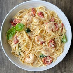 A picture of Creamy Lemon Linguini w/Shrimp Sundried tomato and basil.