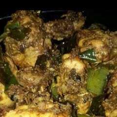 A picture of Chicken pepper fry Kerala style.