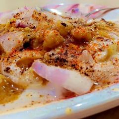 A picture of Aloo tikki chole.