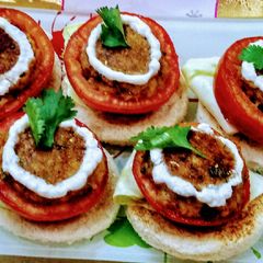 A picture of Stuffed tomatoes canopies.
