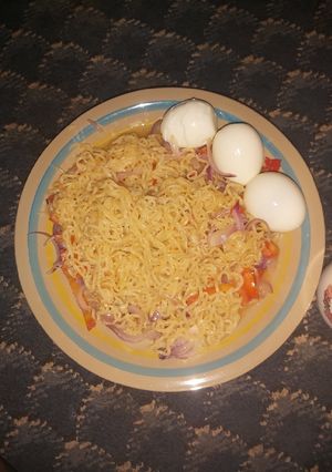 A picture of Onions Noodles with Hard Boiled Eggs.